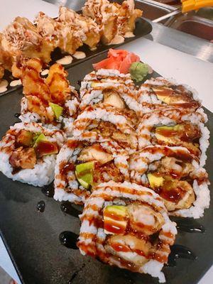 Surf and turf : fried chicken tempura and fried Shrimp tempura, Avocado with eel sauce on top