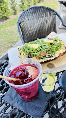 White pizza and hibiscus ranch water and a shot of mezcal