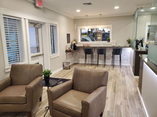 Interior waiting room with garage window and snacks and coffee