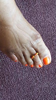 Pedicure and handcrafted toe ring