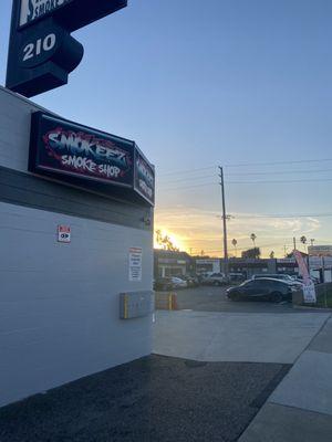 Stopped at Smokeez's Smoke Shop before the beach sunset.