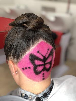 Women's Undercut with Neon pink hair color and a beautiful butterfly !