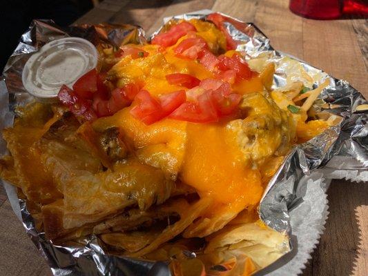 Nachos with fried pita sans onions. Good stuff.  For you MS folks, sans means 'without'.