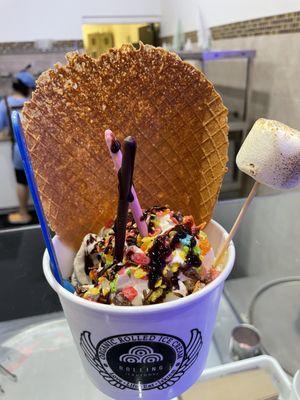 cake batter ice cream, brownies, Fruity Pebbles, chocolate drizzle with Pocky and perfectly toasted marshmallow. Awesomelicious