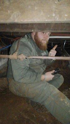 Phil in a crawl space