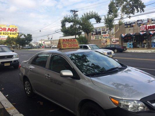 Photo taken right outside of Newark DMV after I passed the test. Yay!!