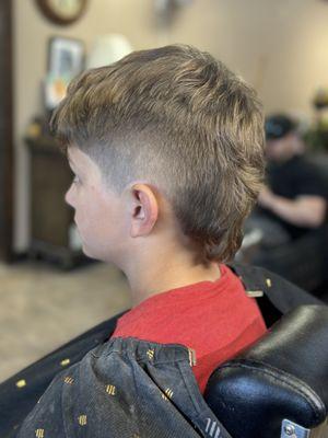 Kids haircut in Ventura. Start of a mullet