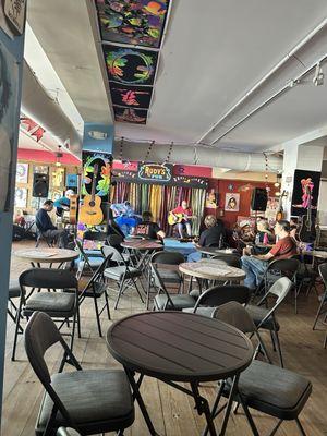 Inside the bar area, looking at the stage.