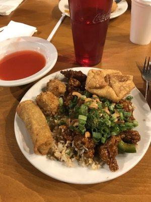 General chicken with onions and cashews and fried rice, egg roll, crab Rangoon, chicken and sweet and sour sauce