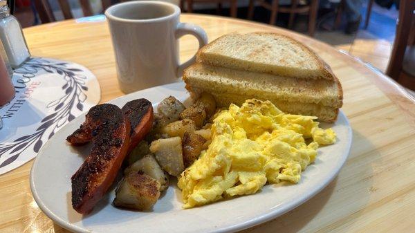 Two eggs, home fries, lingucia sausage and toast.