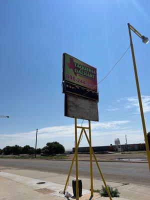 Sign in the front of the restaurant