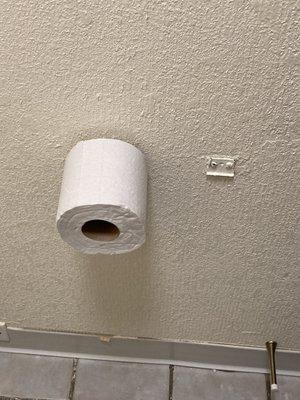 Broken toilet paper holder