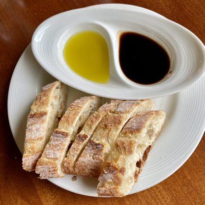 Bread service with olive oil and balsamic vinegar