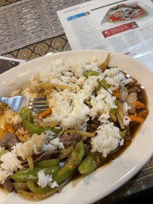 Thai basil stir fry level 3 with steamed rice and beef.