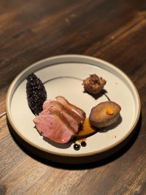 Duck with forbidden rice, oyster mushroom, radish cake with XO sauce