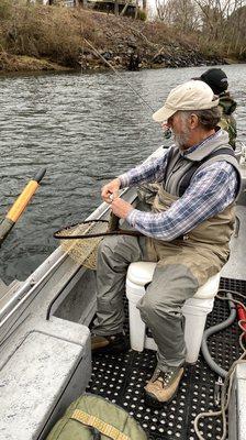 Guide George unhooking the trout.