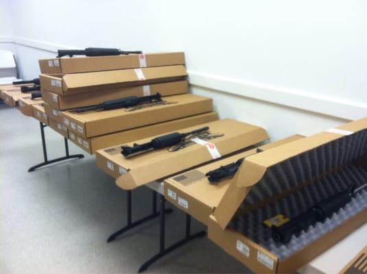 Piles of AR-15 uppers.