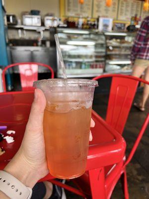 Delicious iced tea shaker w/ black tea, peach, and mango added. Wonderful service and a comfortable environment. Will definitely be back!