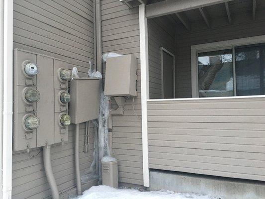 These were taken last winter. Ice on electrical boxes because gutters and downspouts do not work properly.