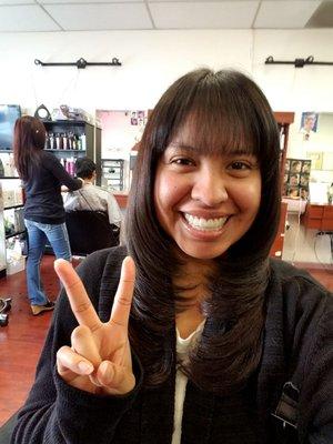 I finally got my haircut and bangs done by Tracy she's in the background attending another client.