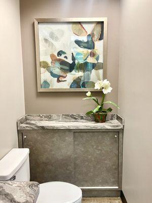 Our beautiful office bathroom is the perfect spot to take a quick break.