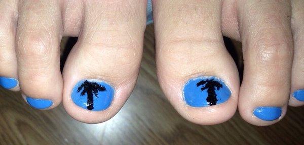 Pedicures with simple hand painted designs.