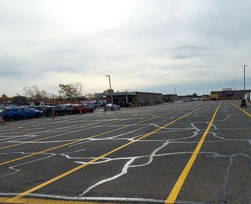 Crack fill and line stripe commercial parking lot