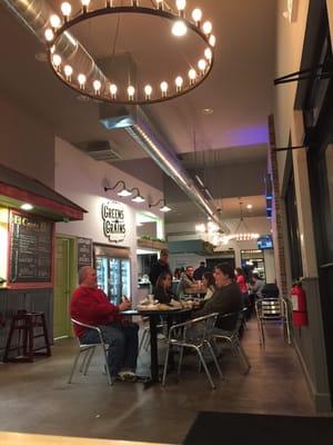 The inside of the food court with 4 food stands