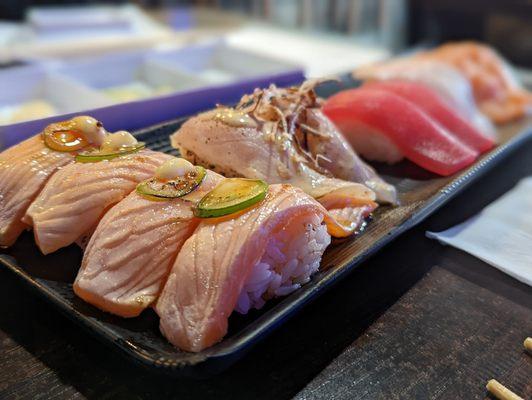 Seared salmon, seared albacore, tuna, yellowtail, salmon ( left to right)