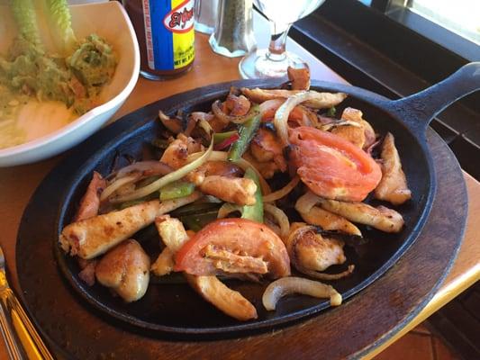 Chicken fajitas (also came with rice, beans, guac, pico, and sour cream)