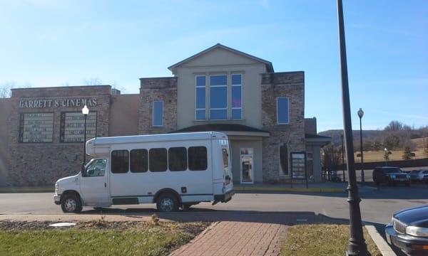 Outside of theater. Bus in the way.