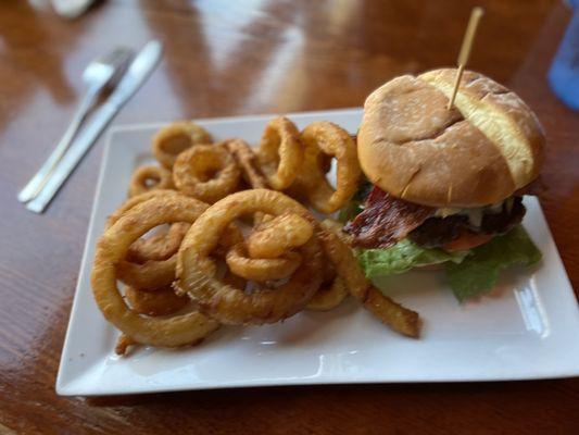 Bacon blue cheese burger with onion rings. Delicious!