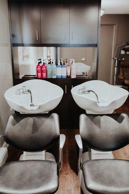 Shampoo bowls are clean, comfortable, and adjust to each clients needs.