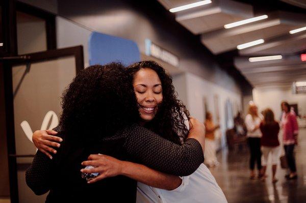 People greeting each other at Christ Fellowship Church in Boynton Beach, FL