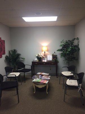 Dimly lit private waiting room with soft music and Zen-chime fountain (not shown in picture).