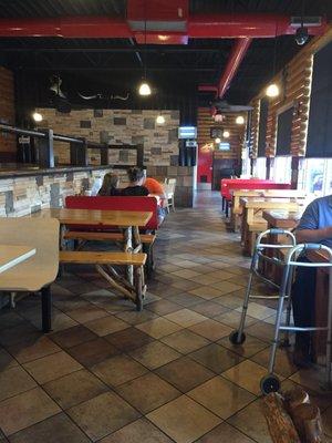 Interior shot. I love the bark/tree-inspired tables.