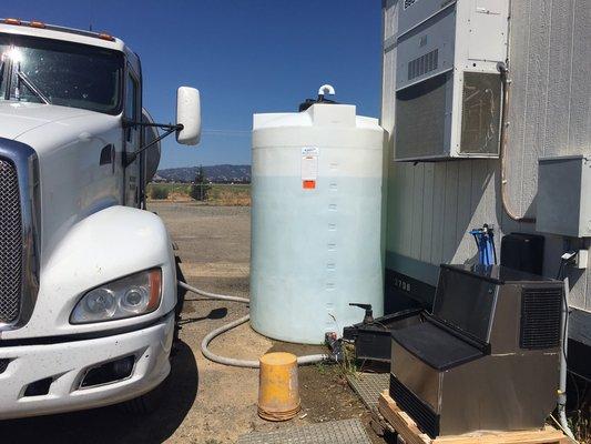 1100 gallon tank, jug fill station with ice maker.