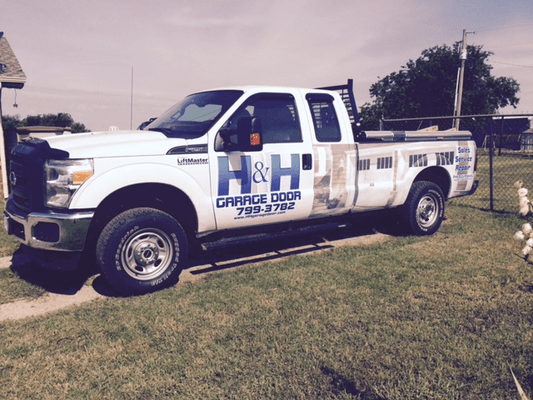 Watch for our service trucks: H & H Garage Doors