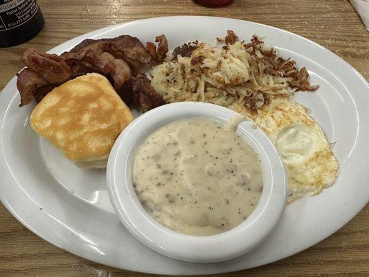 Biscuit and gravy with gravy on the side