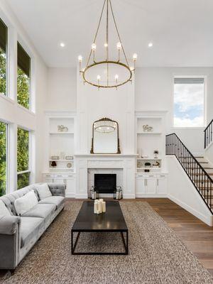 New Wood Floor and Open Staircase. New White Fire Mantel with Recessed Cabinet