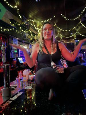 A regular sitting on the bar drinking our new drinks while the bartenders knew and didn't stop it.