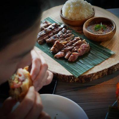 Near Yang with Jeaw sauce and Sticky rice. ( Beef Steak  ** medium rare**)