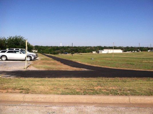 Walk track and parking area North East on hill