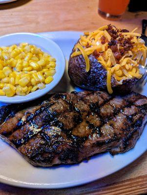 12oz New York Strip with loaded baked potato and buttered corn