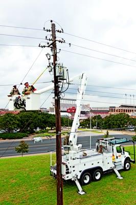 Lineworkers in a bucket truck