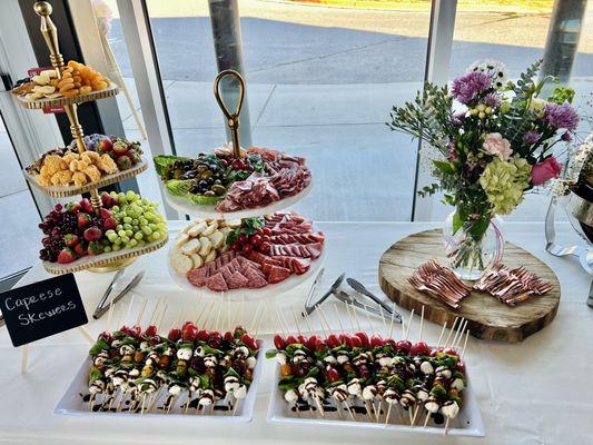 Charcuterie (Fruits, Veggies, Cheese, Italian Meats) with Mozzarella Caprese Skewers.