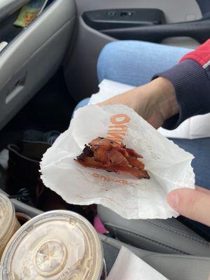 The portion of snack n bacon we were given in the nearly empty single serving pouch.