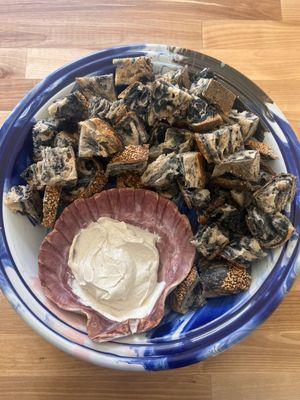 Charcoal Sesame sourdough and our housemade Truffle Cashew spread.