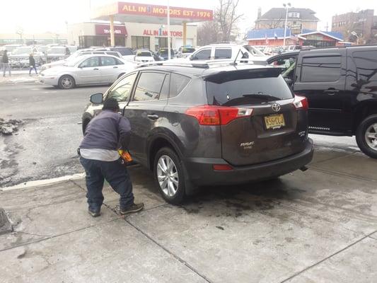 Giving mom's car a good cleaning after the harsh winter.