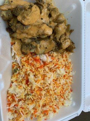 Chicken with coconut curry sauce and the veg pulao